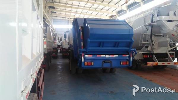12.  HOMAN GARBAGE COMPACTOR 5M³