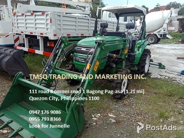 15. FARM BUDDY with loader attachment