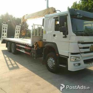 HOWO T7H 6X4 SELF LOADING TRUCK WITH 10 TONS BOOM | PostAds PH