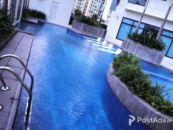 BGC CENTRALLY LOCATED! CONDO AND/OR PARKING SLOT FOR RENT 