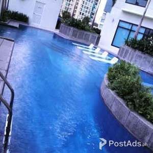 BGC CENTRALLY LOCATED! CONDO AND/OR PARKING SLOT FOR RENT | PostAds PH