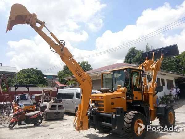 Brandnew backhoe loader with optional attachment ready breaker line