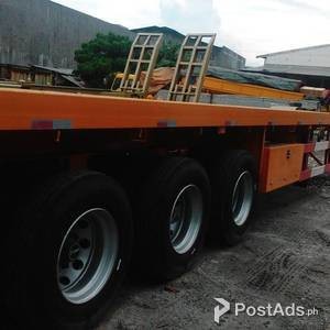 TRI FLATBED 12 LOCKS 45 TONS SEMI-TRAILER | PostAds PH